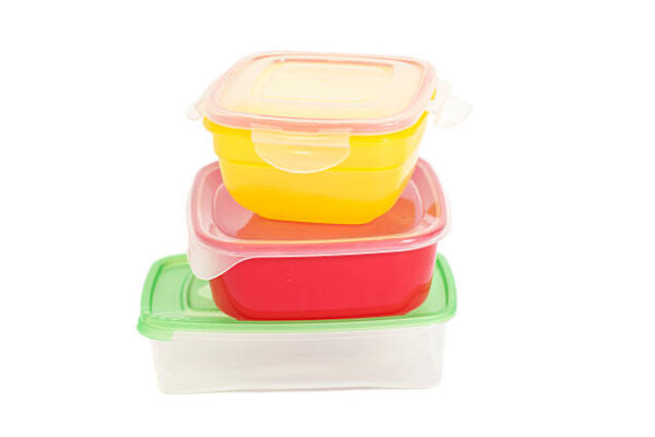 Stack of food plastic containers isolated on white