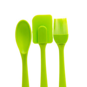 Green cooking silicone spatula isolated over the white background