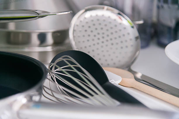 The various tableware on shelf in the kitchen
